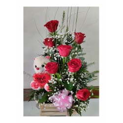 Rosas y peluche